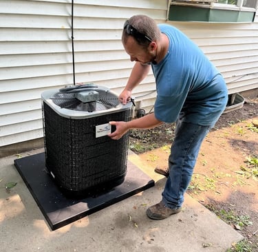 Owner, Dan, putting the final touches on the A/C install in Theresa, WI.