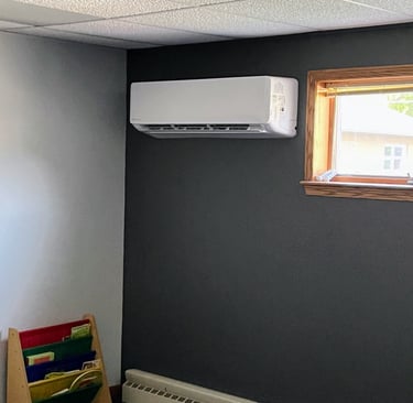 Mini Split Heat Pump installed in West Bend helps bring heat and AC to a hot classroom.