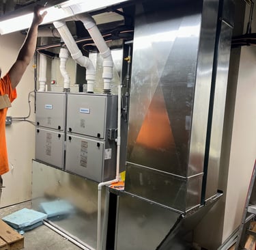 Tandem furnace installation at commercial building in Mayville will help heat and cool a large space