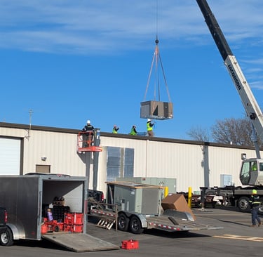 Installing a commercial roof top unit in Watertown, WI.