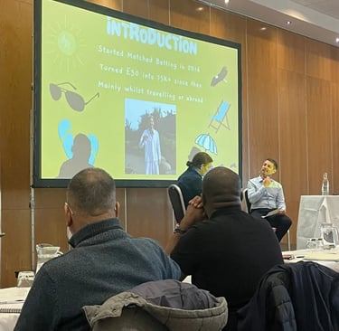 being interviewed and speaking on stage at a seminar