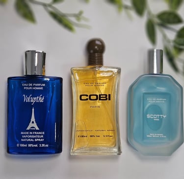 a variety of perfumes on a table