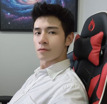 a man sitting in a chair with a computer