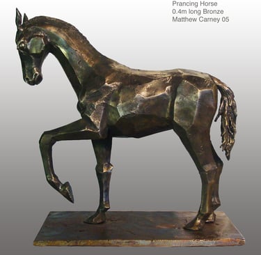 a bronze statue of a horse
