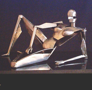a chrome plated steel sculpture of a futuristic woman reclining