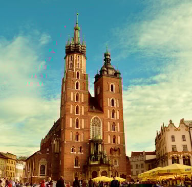 a large church with a tall tower in the middle of it
