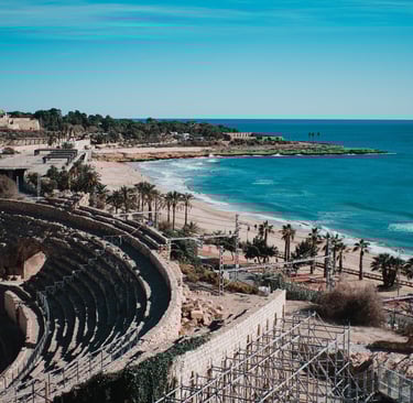 a large arena with a view of the ocean