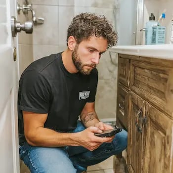 MoldWarden inspector testing air quality in North County San Diego