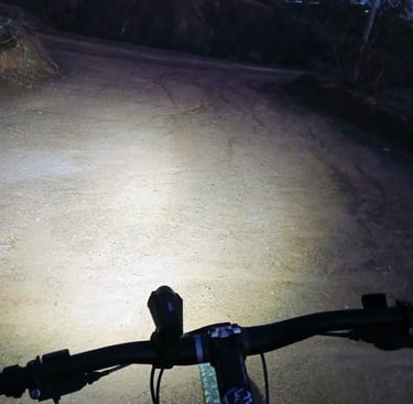 pov of mtb night light on handlebar