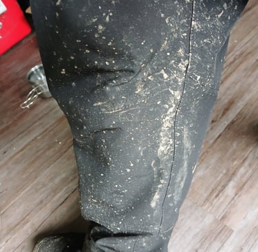 adean trails pants covered in mud after ride