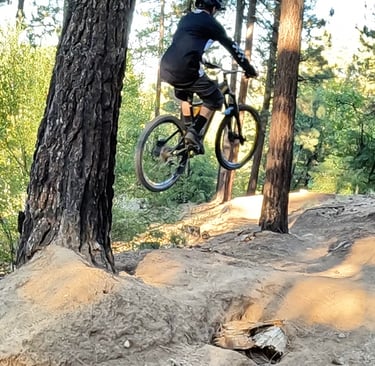 mountain biker leveling out the bike mid air