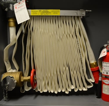 fire hose installed with fire extinguisher