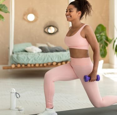 a woman in pink sports bras and a pink bra top exercising