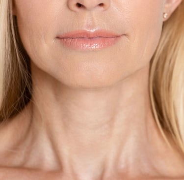a woman with blonde hair and a white shirt