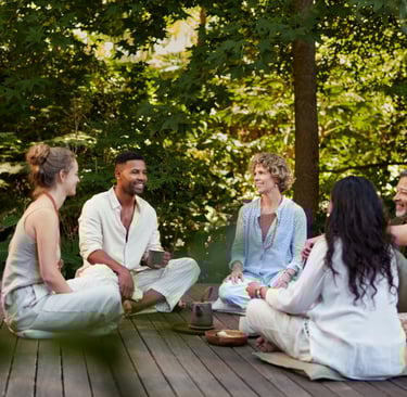a group of people sitting on a deck