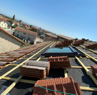 pose velux et tuile sur toiture 