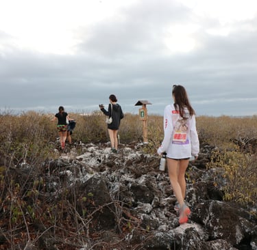 Family exploring Galápagos during a luxury cruise excursion