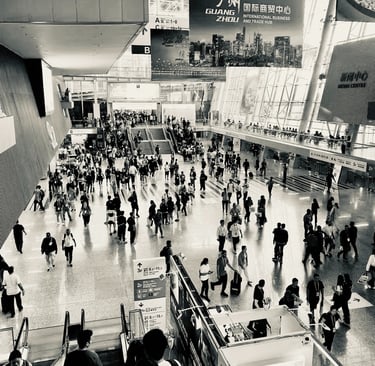 a crowded trade hub with people walking around