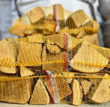 Net of kiln dried hardwood logs