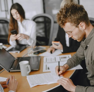 A team reviewing their post-merger cyber integration plan
