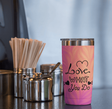 Pink tumbler with 'Love What You Do' quote – POD mockup