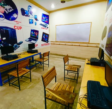 a room with a laptop and a laptop on a table