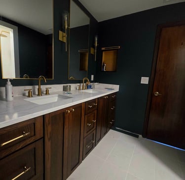 a bathroom with a double sink and a mirror