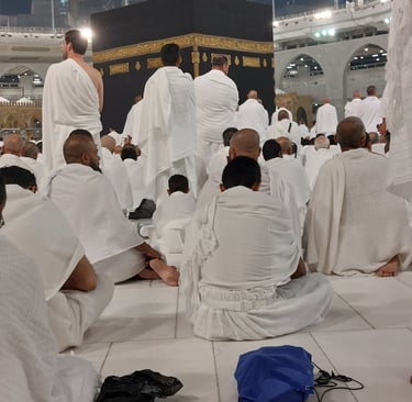 People offering prayer in front of Kaaba in Masjid Al-haram