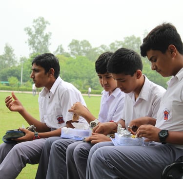 school students having lunch together
