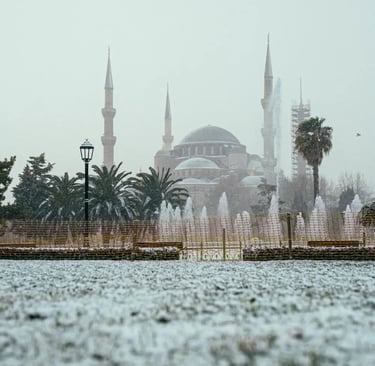 View of snow-covered Hagia Sophia and Sultanahmet Square during winter in Istanbul.
