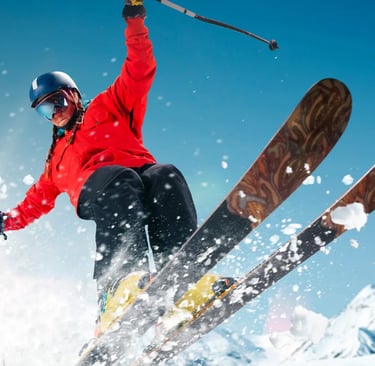 Skier carving through fresh powder snow, dynamic winter action shot in the French Alps.