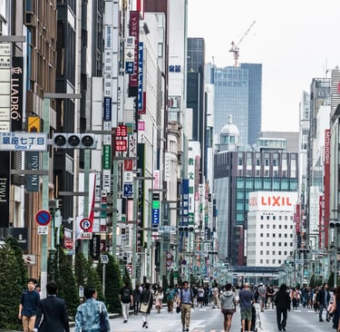 Pedestrian-friendly Chuo Dori street in Ginza Tokyo lined with designer stores, modern buildings,