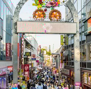 Ginza luxury shopping street with designer stores and night reflections – elegant Tokyo neighborhood