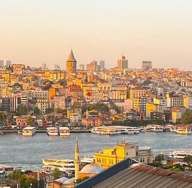 View from a boutique hotel balcony overlooking the Bosphorus at sunrise in winter.