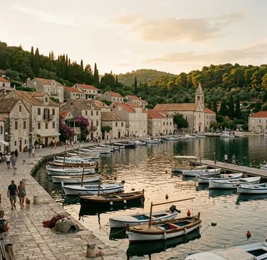 Šipan harbour village with stone houses and fishing boats at golden hour