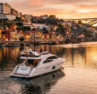  Private luxury yacht cruising the Douro River in Porto with Dom Luís Bridge at sunset.