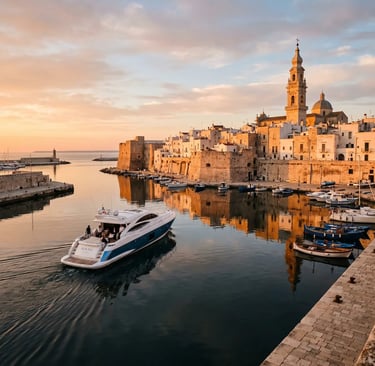 Luxury motor yacht leaving a historic Puglian harbour at golden hour with a baroque church tower