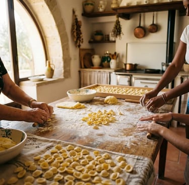 Fresh orecchiette drying on wooden table in traditional Puglian home kitchen during cooking class