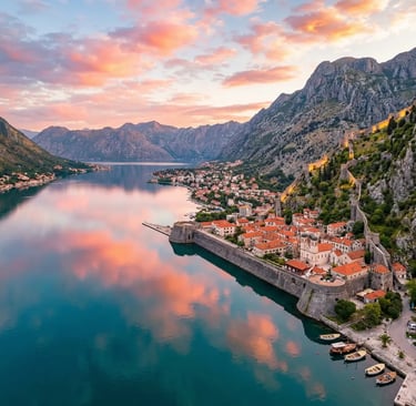 Aerial sunset view of Kotor Bay walled city and mountains in Montenegro