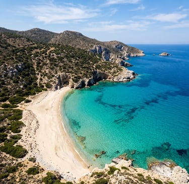 Aerial view of pristine beach and turquoise water at Poliegos island Greece
