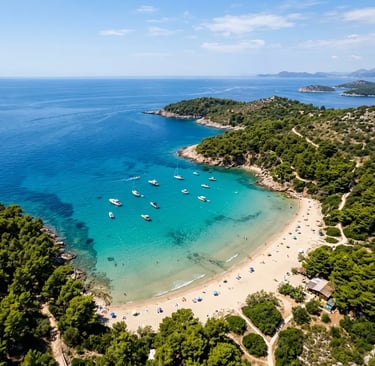 Aerial view of Sunj sandy beach on Lopud with turquoise water and anchored boats