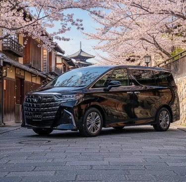 Black luxury Toyota Alphard taxi parked on a historic Kyoto street with cherry blossoms