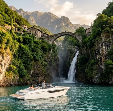 Private luxury boat approaching Orrido di Nesso waterfall beneath stone bridge on Lake Como Italy