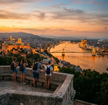Travelers overlooking Buda Castle and the Danube River at golden hour in Budapest