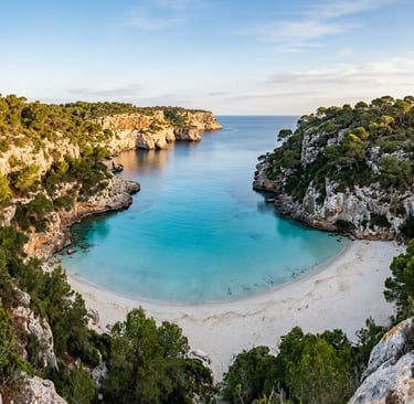 Empty Cala Macarella cove in Menorca with turquoise water and limestone cliffs