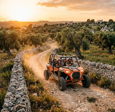 Orange off-road buggy with four passengers on dirt trail, trulli and olive groves at golden hour