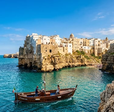 Traditional wooden boat approaching Polignano a Mare cliffside town from the Adriatic Sea