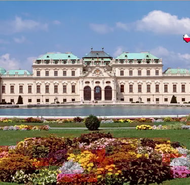 The historic baroque Belvedere Palace and gardens with the Austrian flag overlay.