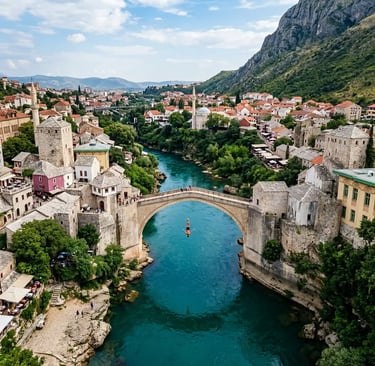 Diver jumping from Stari Most bridge into turquoise Neretva River in Mostar