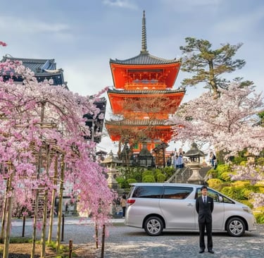 Private tour van with driver parked near Yasaka Pagoda in Kyoto.